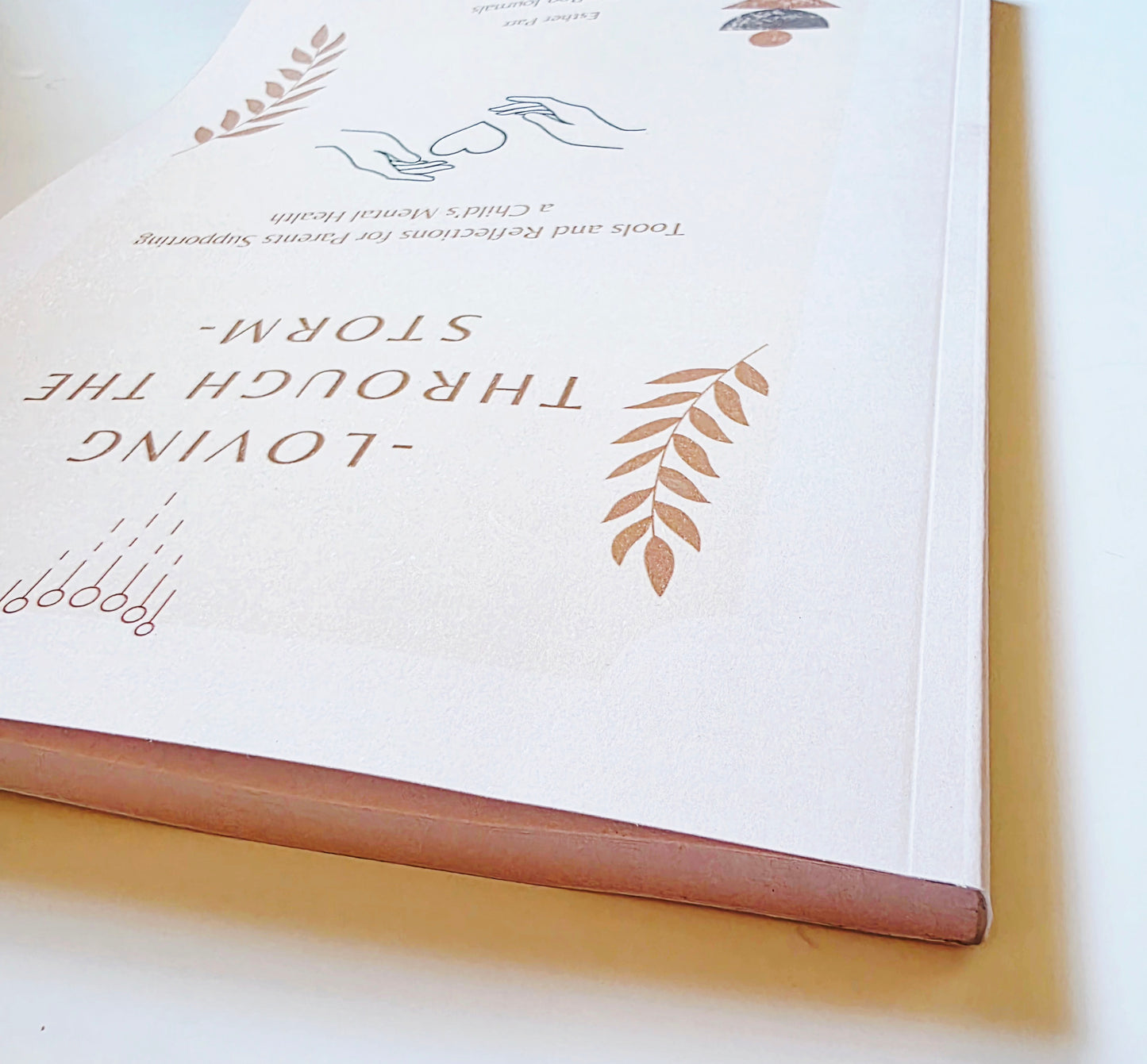 paperback book with printed text and decorative elements on a cream background