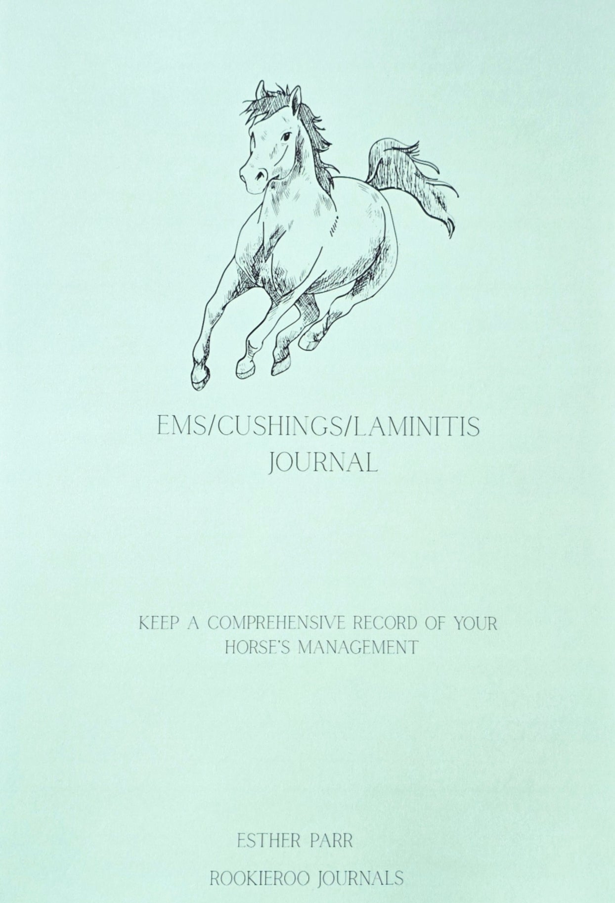 Journal cover with a horse illustration on a light green background