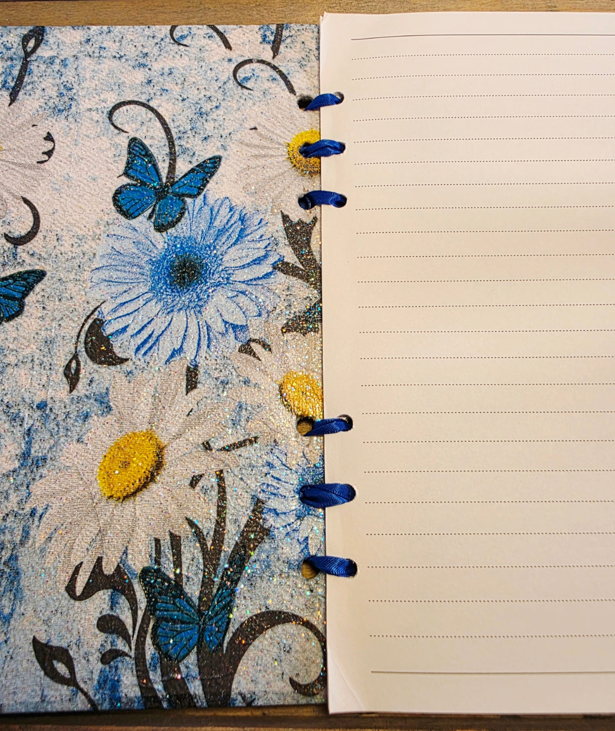 Notebook with floral design on cover and lined pages