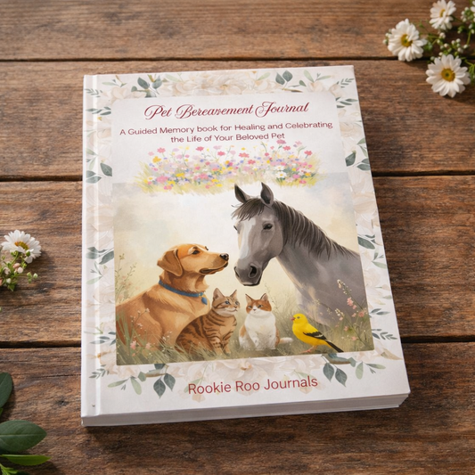 beige coloured journal with leafy border. A selection of different domesticated animals on the front with more flowers near the top