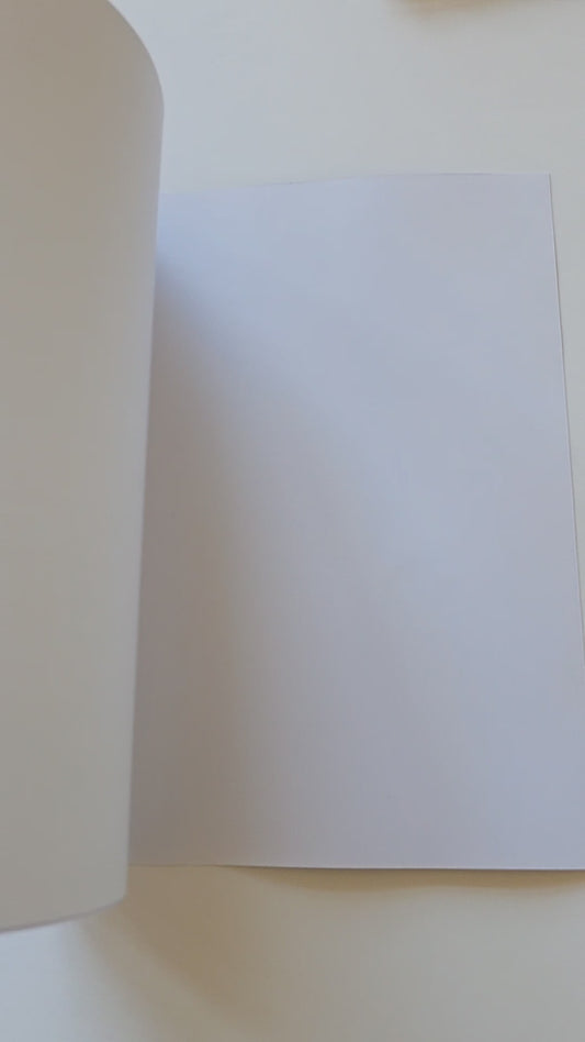 video of a journal entitled 'Our Dementia Journey' Pages being flicked through