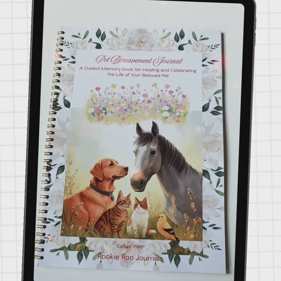 video of the pages of a pet bereavement journal