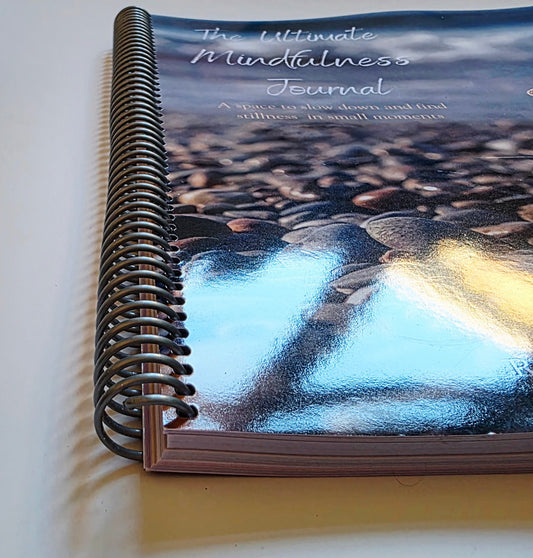 Mindfulness journal with spiral binding and nature-themed cover